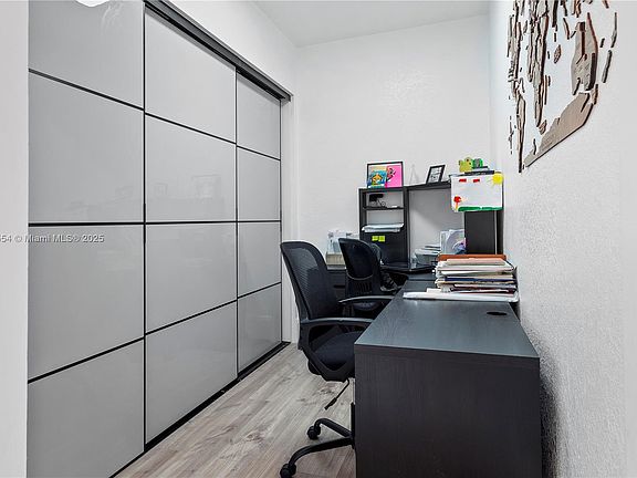 5th image of 10945 W 33rd Ct #10945