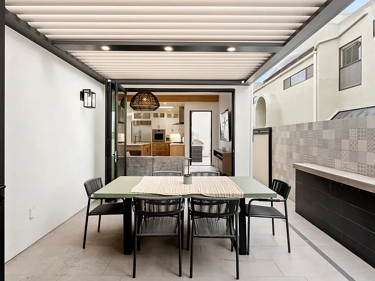 View to Outdoor Dining Area from Downstairs Bedroom