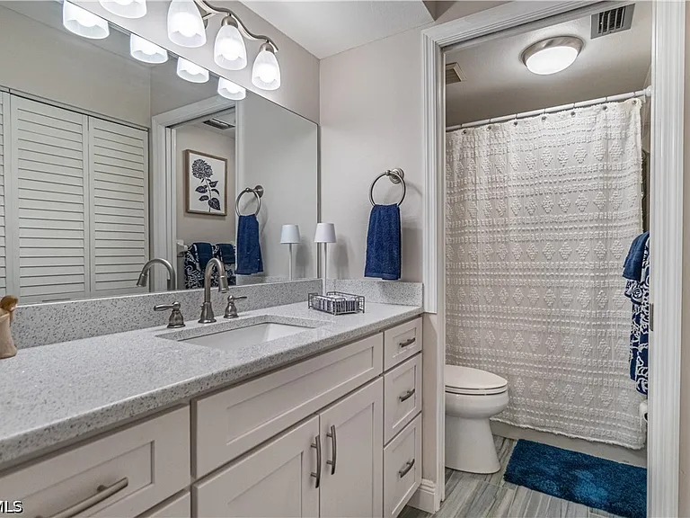 7430 Lake Breeze Dr #403 — Photo 12