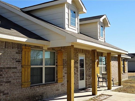 Enjoy morning coffee on expansive front porch