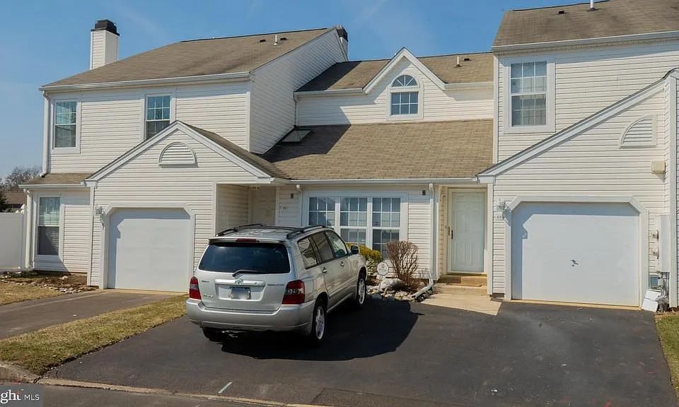 Driveway and Garage. Right side