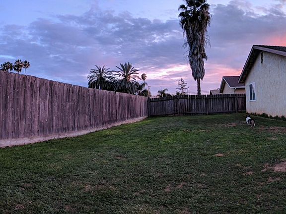 large fenced backyard with no neighbor in back
