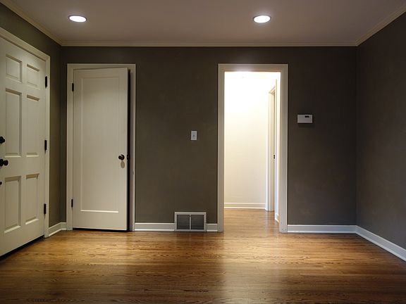 Upstairs view from living room to bedrooms and bath