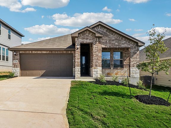 Front exterior of the Hughes floorplan at a Meritage Homes community.