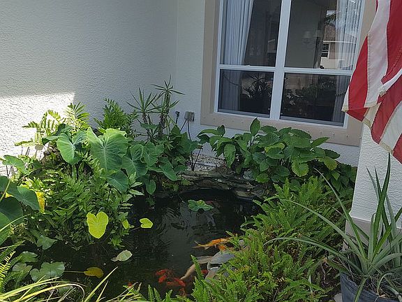 Front entry with pond