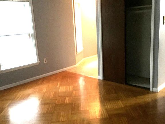 Living Area with Full close leading into the kitchen