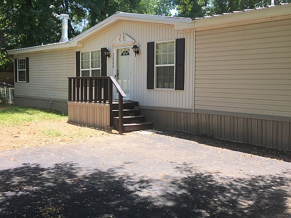 Front door, asphalt driveway