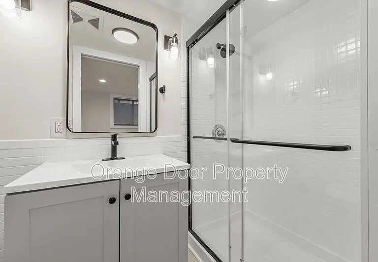 7727 Jones Ave NW — Photo 28