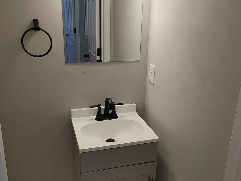 Half bathroom off the main living area.