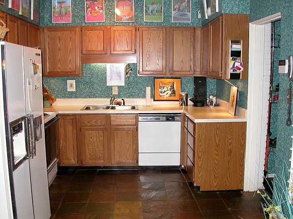 Kichen is an eat in kitchen, has slate floors