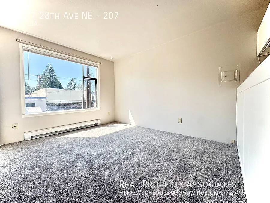 Building Photo - 11527 28th Ave NE #207