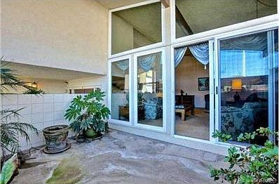 Newer sliding glass doors from the living room to your private f