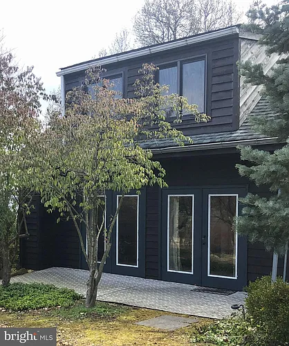 8376 Meadows Rd #COTTAGE Photo 1