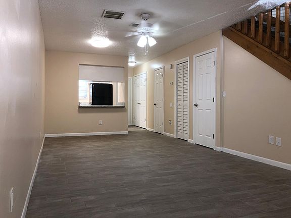 Main living space with additional storage closets