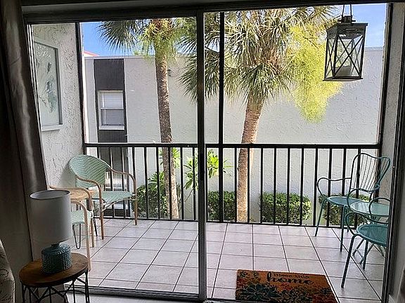 Tiled and screened balcony  