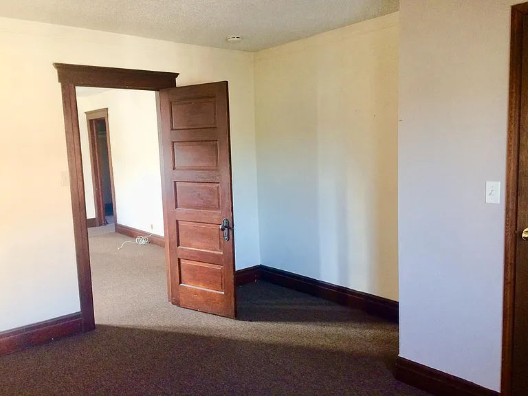 Natural wood finish doors, trim & kitchen through out home.