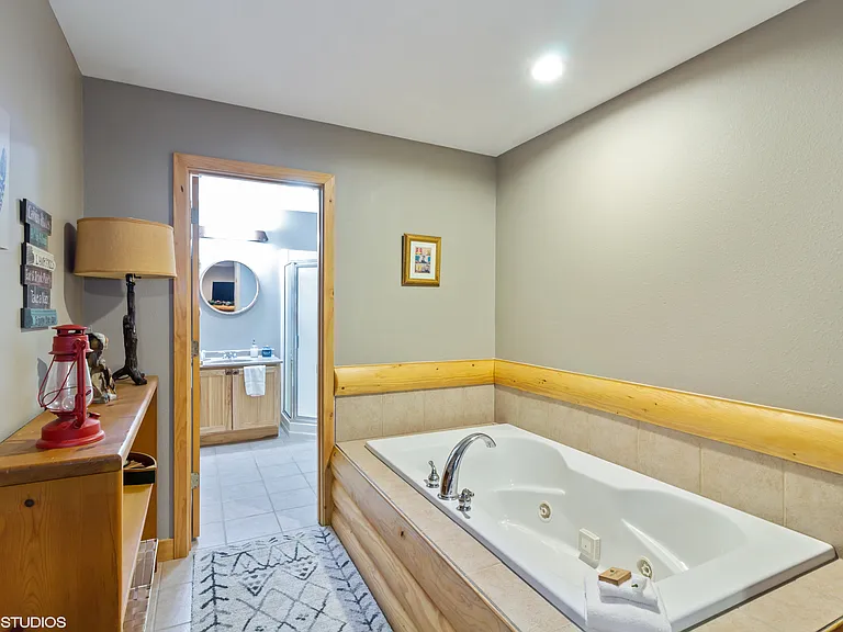 Lower level queen bedroom tub