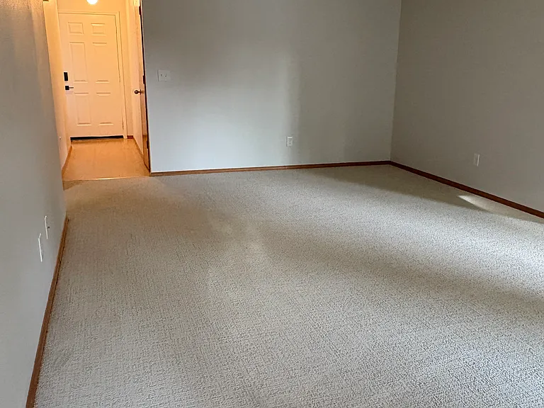 View from the end of the living room back to front door.