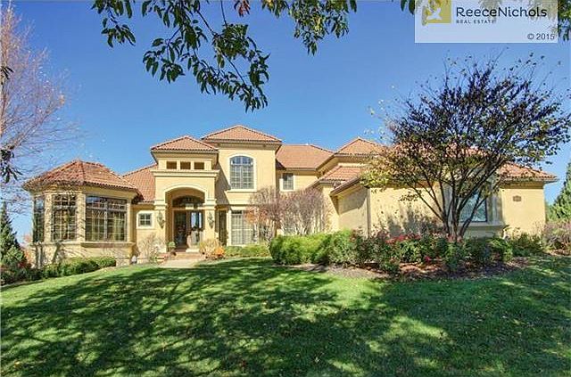 Pristine 1.5 Story in the gated community of Loch Lloyd!