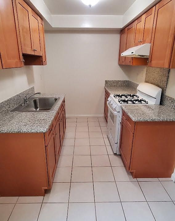 Granite countertop. Tenant provides own refrigerator.