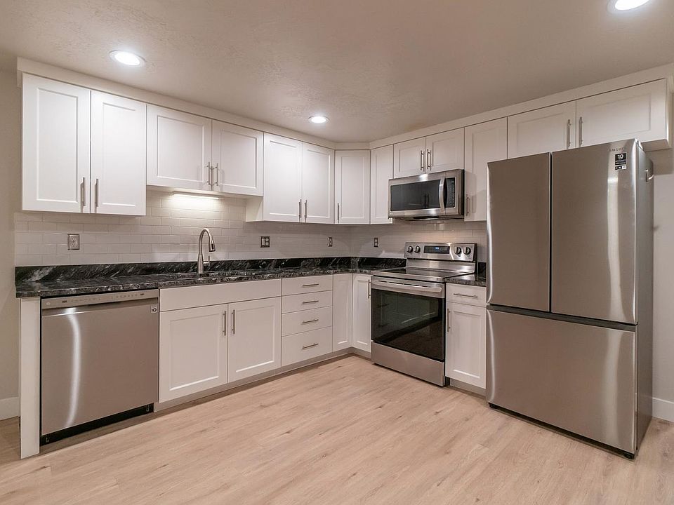 Brand new Kitchen. Modern, open design. Granite counter tops, dishwasher, electric stove, in-unit ice maker in freezer. Luxury Vinyl Plank Flooring