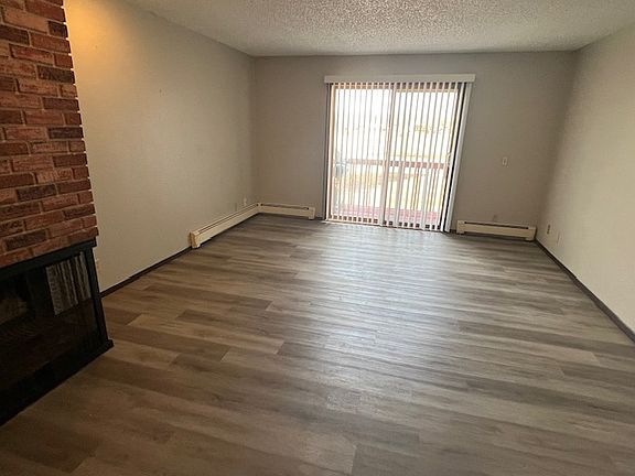 Living room with LVT and deck area