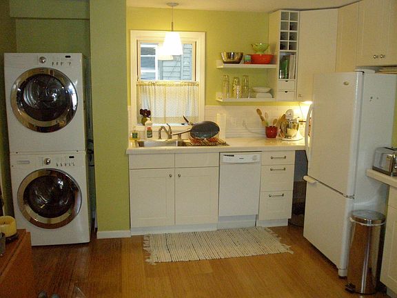 Kitchen w/ washer and dryer