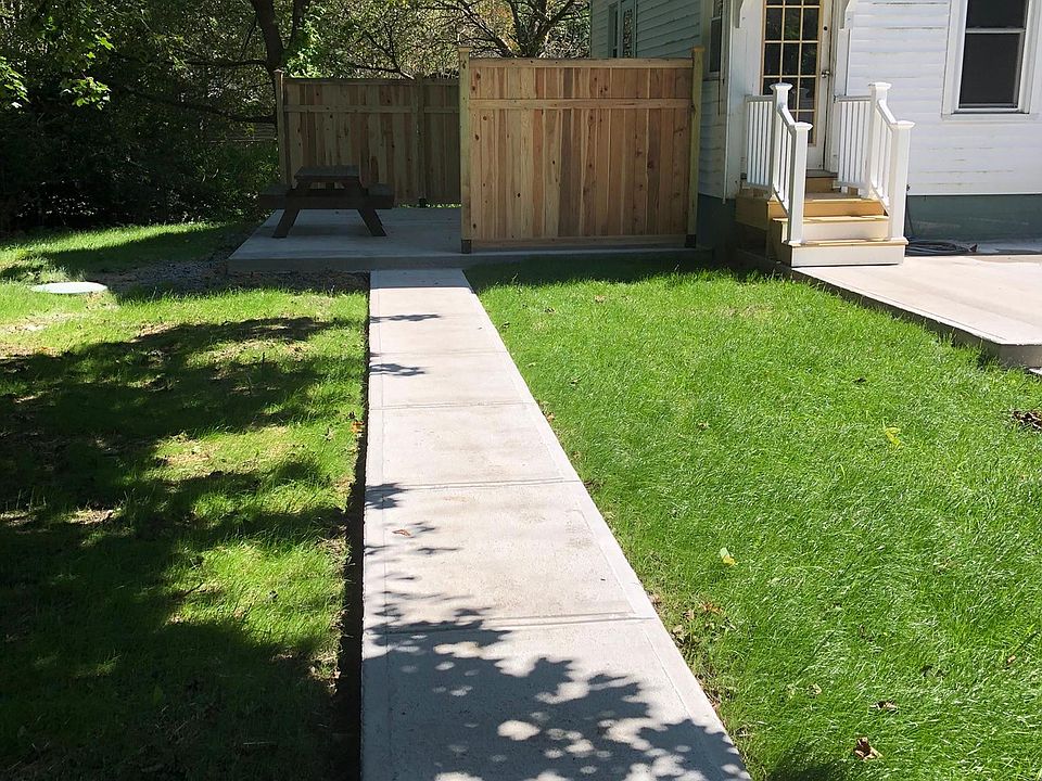 New walk and fenced patio