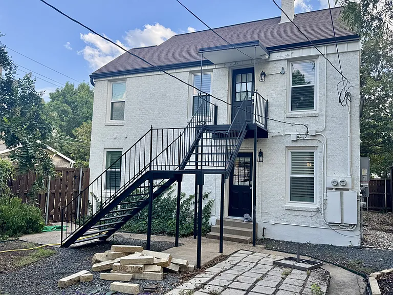2nd entrance for both the lower level duplex unit, and the upper level duplex unit. This entrance is located in the shared backyard.