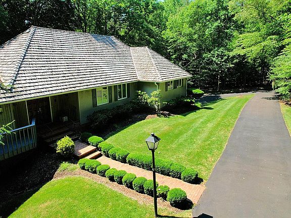 5th image of 8011 Woodland Hills Ln
