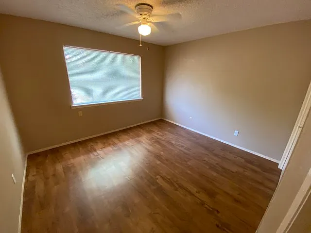 View looking into bedroom 1. Closet is out of view on the right.