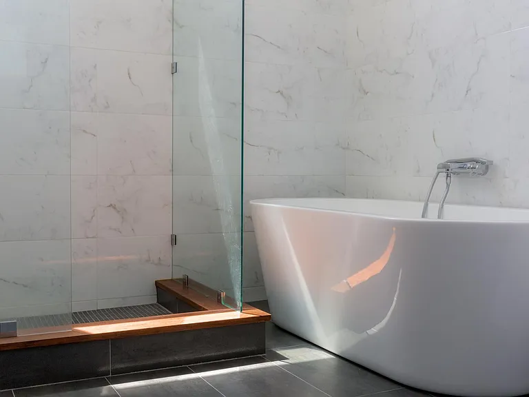 Primary bathroom with walk-in shower and soaking tub