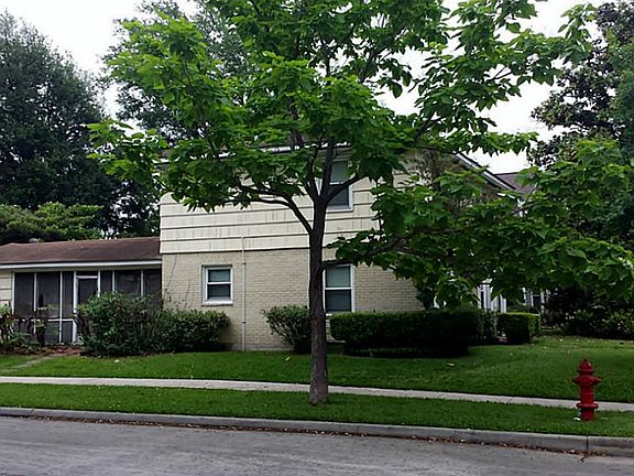 Side view of 2924 Rice Blvd showing the corner lot.