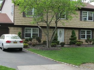 82 Strathmore Village Dr, South Setauket, NY 11720