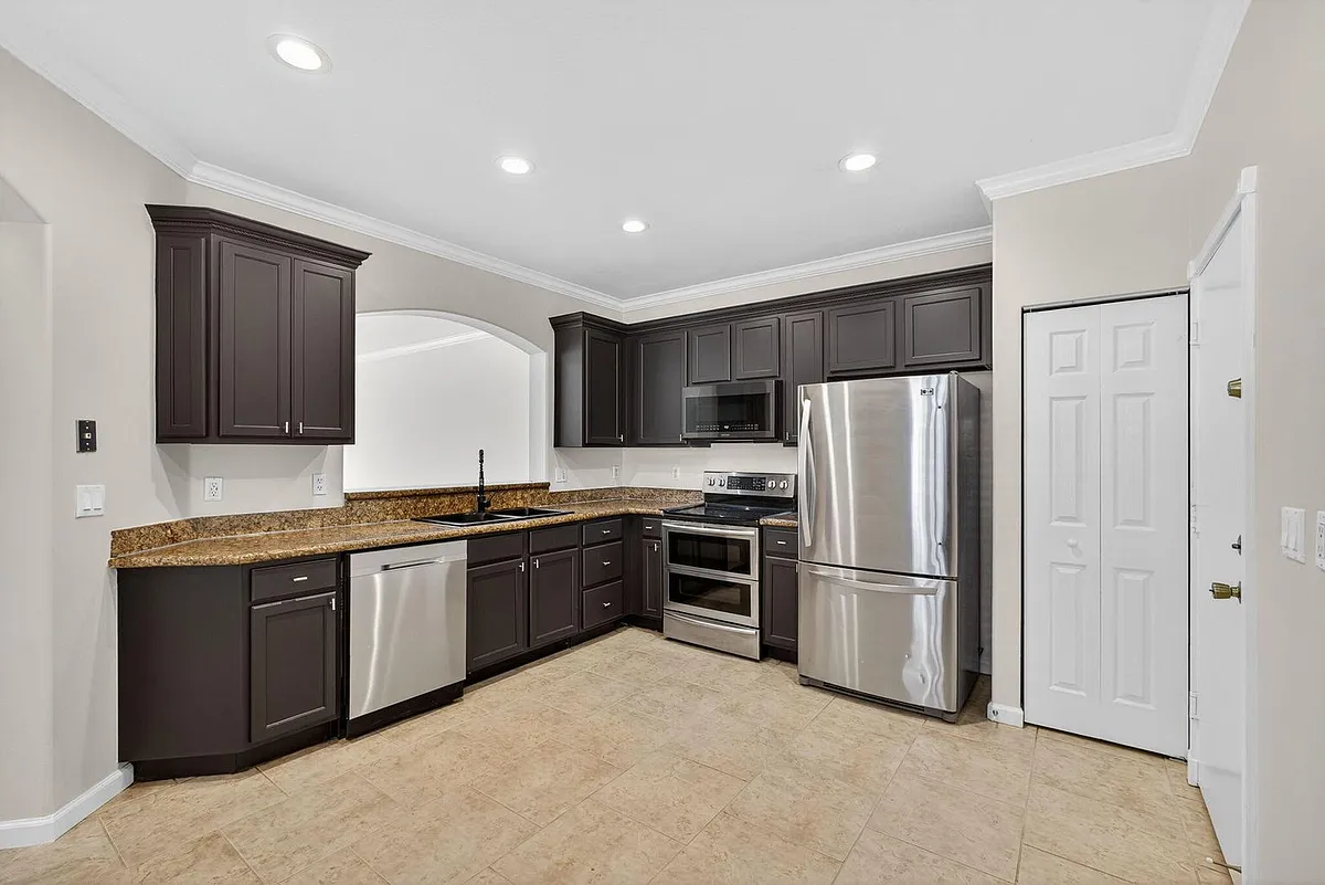 Photo 1 of 24 - 2213 Oakmont Dr #0 - Riviera Beach, FL Primary Photo - 2213 Oakmont Dr #0