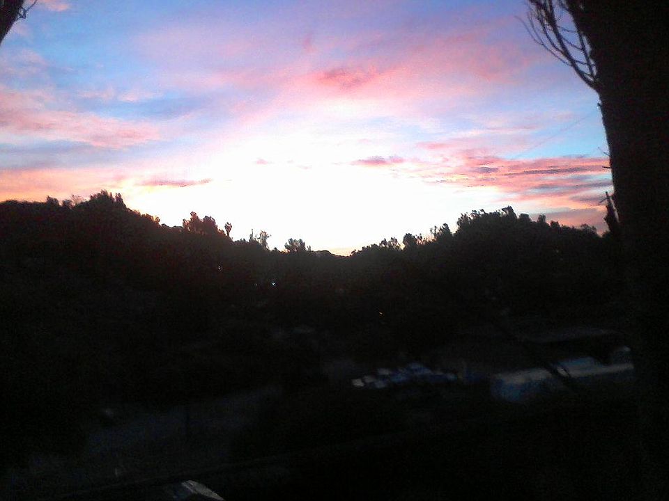 Sunrise in front of house