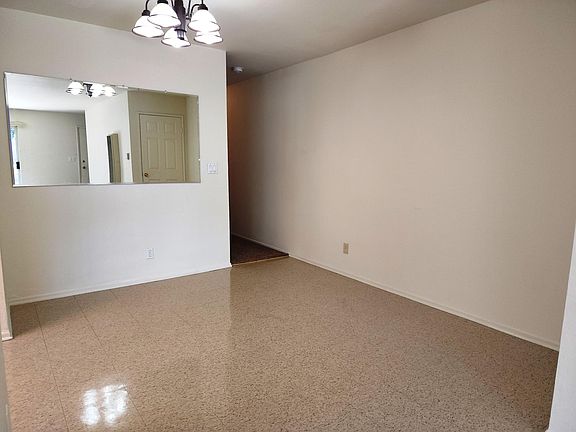 Dining area adjacent to kitchen and living area