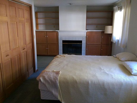 Master bedroom with fireplace and lots of storage