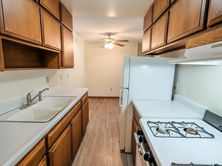 Step into modern living at Central Lakes of Uptown. This inviting kitchen features sleek cabinetry, ample counter space, and updated appliances, perfect for culinary enthusiasts. Elevate your lifestyle and schedule a tour today!