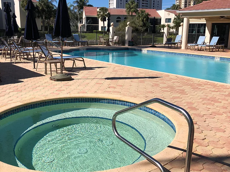 Jacuzzi, heated pool, and clubhouse just steps from our unit