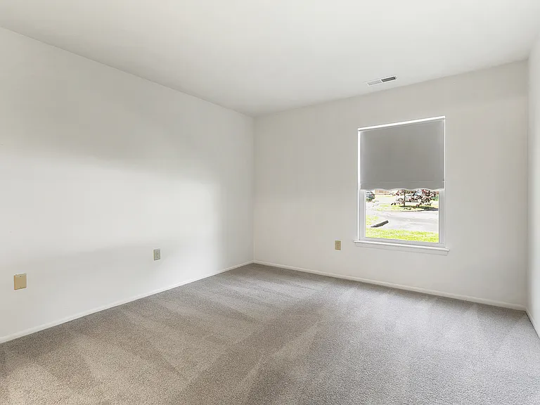 Spacious Primary Bedroom in the 2-Bedroom 1.5-Bath Floor Plan