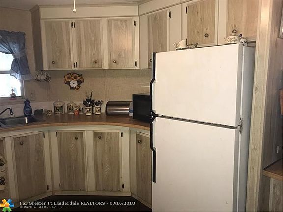 5th image of 460 NW 51st Ct