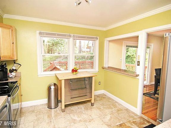 KITCHEN with BREAKFAST BAR for CASUAL DINING!