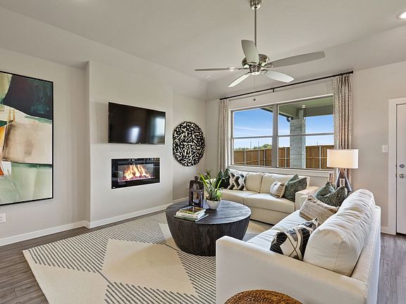 Living room in the Topaz home plan by Trophy Signature Homes - REPRESENTATIVE PHOTO