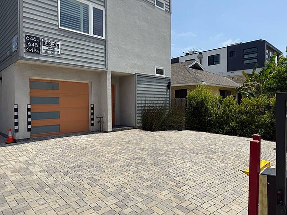 RARE 3 CAR PARKING OR OUTDOOR PATIO AREA - 2 CAR GARAGE AND ONE CARPORT PARTKING