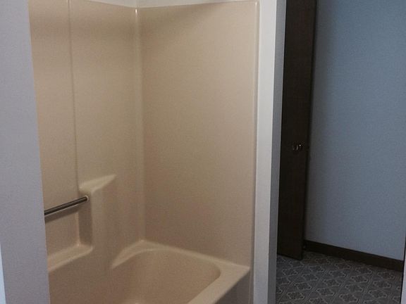 32 inch square shower with glass door in this efficiency