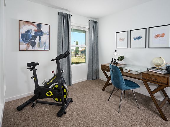 Secondary bedroom of the Olympic plan modeled at Lakes at Bella Lago.