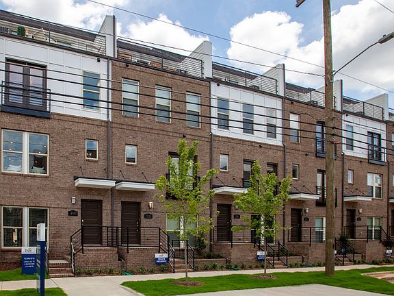 Modern Exteriors with Brick and Roof Top Terraces facing the city skyline