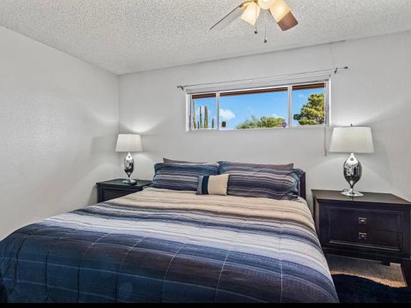 New king size mattress with 43' new smart TV, and walk in closet