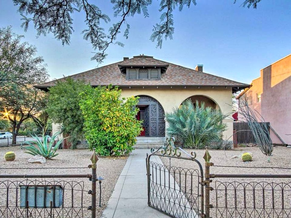 Grand corner lot .
Ample parking right in front of home and along side of the house . Custom Wrought iron metal gate work on entrance way